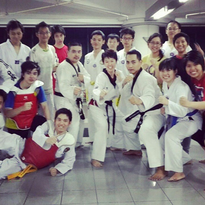 Group of martial artists after a taekwondo sparring session, representing Naga’s martial arts journey